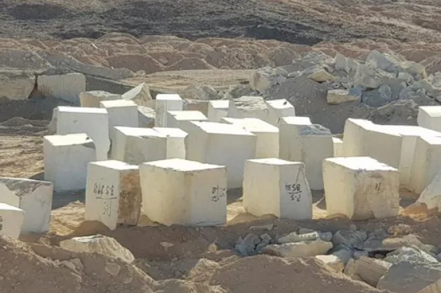 Numbered stone blocks cut and waiting at the quarry